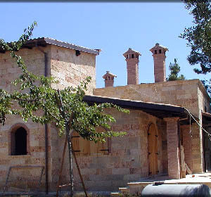 Rivestimento esterno a pannelli di pietra rustica